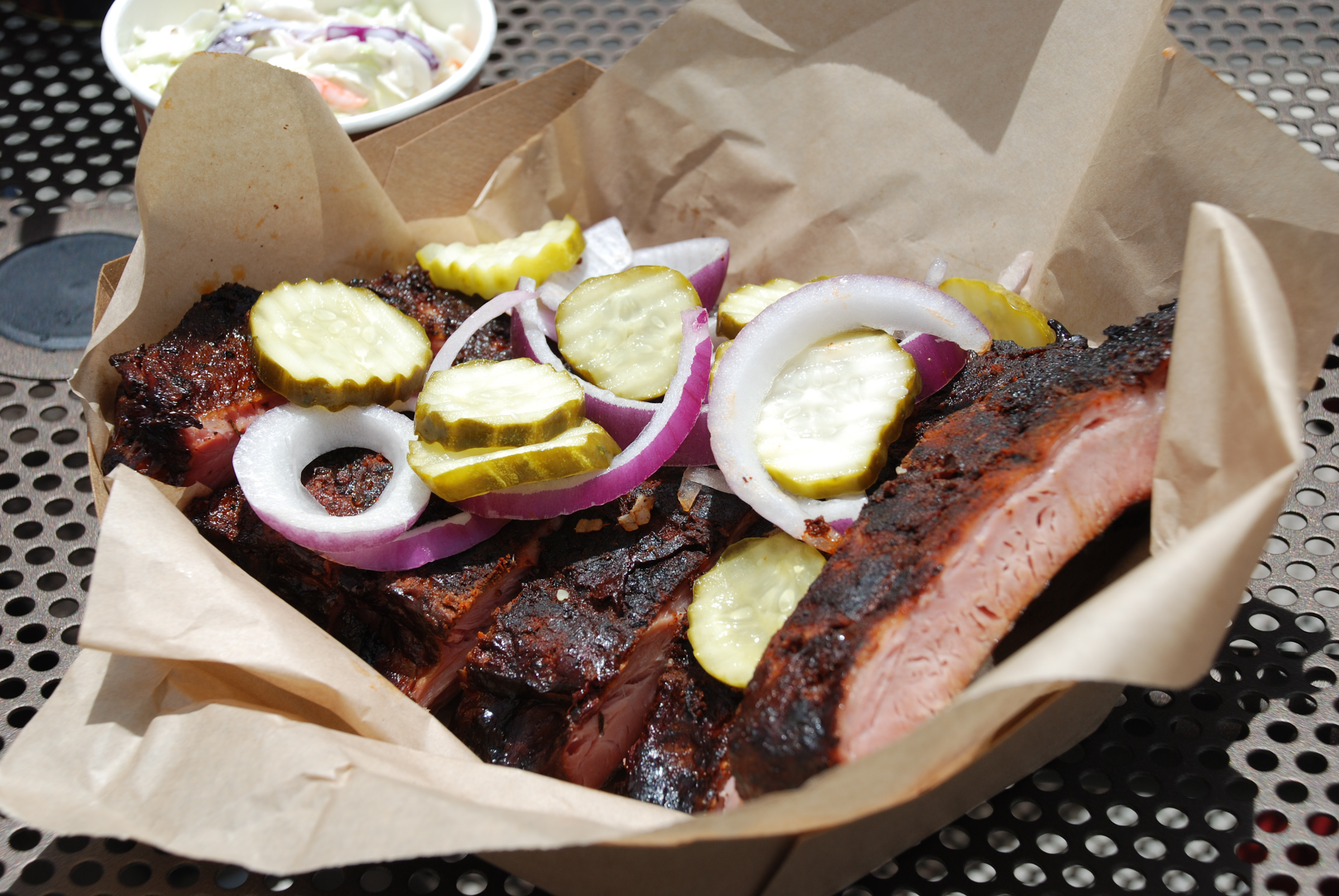 Promotional photo of BBQ brisket plate available for purchase